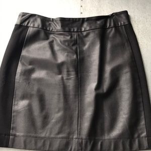 Black leather skirt with fabric insert on sides
